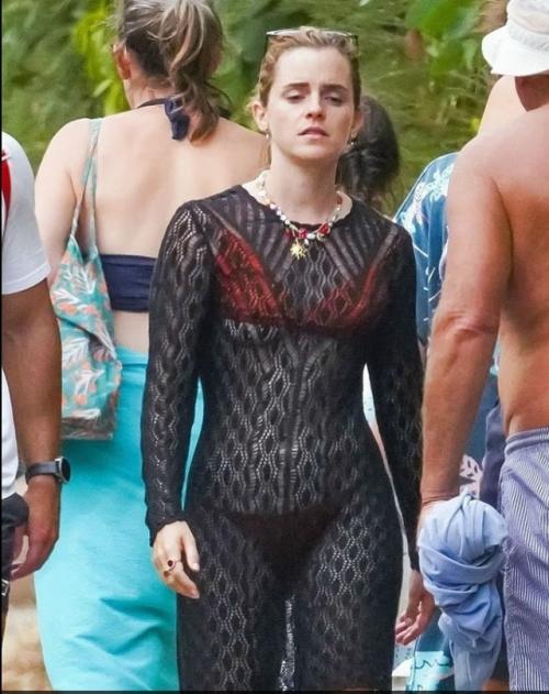 Эмма Уотсон прогуливается в прозрачном кружевном платье со своим накачанным персональным тренером во время похода в сен - тропе. 01