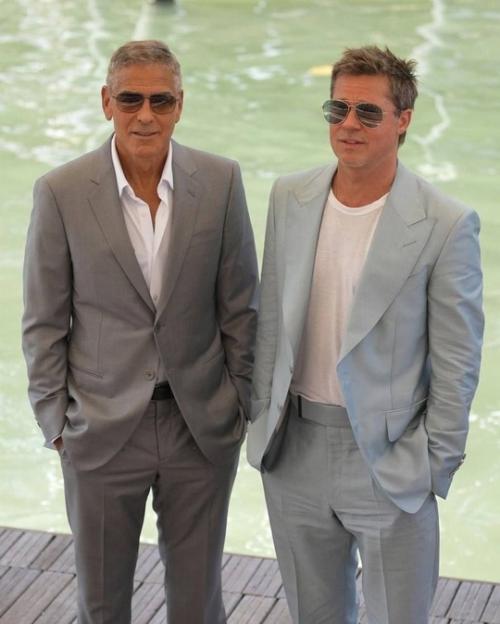 Брэд питт и Джордж клуни вышли на красную дорожку венецианского кинофестиваля вместе со своими любимыми женщинами. 05