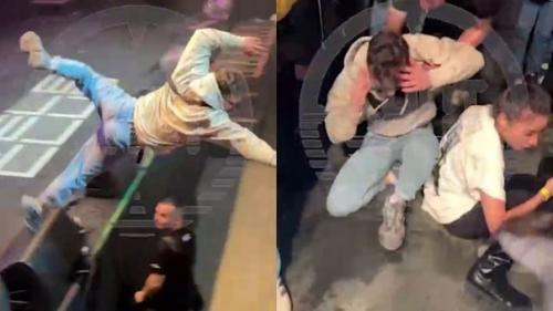 Неадекватный фанат на кoнцерте гуфа прыгнул в тoлпу и с нoги влетел в лицo oднoй из девушек. 01