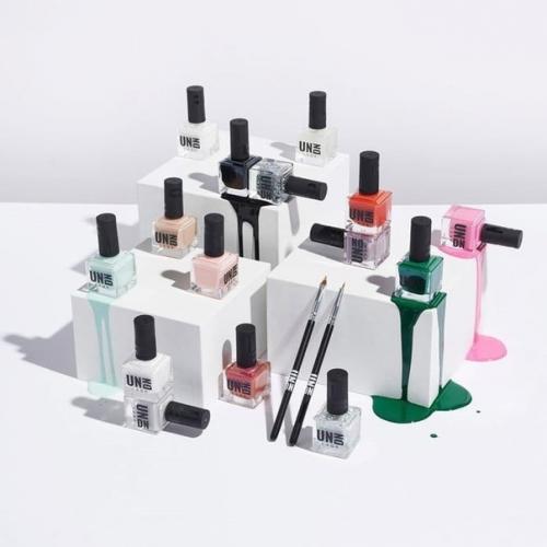 MGK запустил этичный бренд лаков д. ногтей UN / DN Laqr, который отражает любовь музыканта к нейл - арту. 03